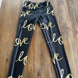 Goldsheep Love Script Leggings, XS Black Gold Glitter Print Writing Sparkle